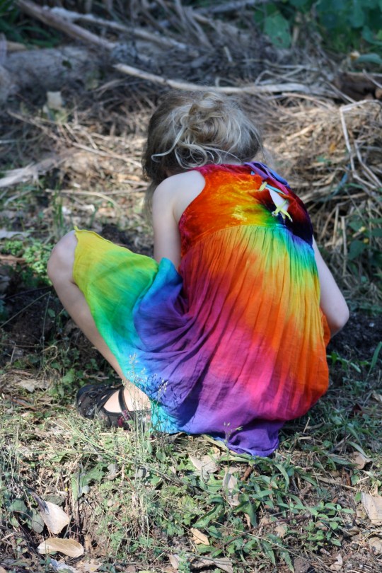 child exploring a garden